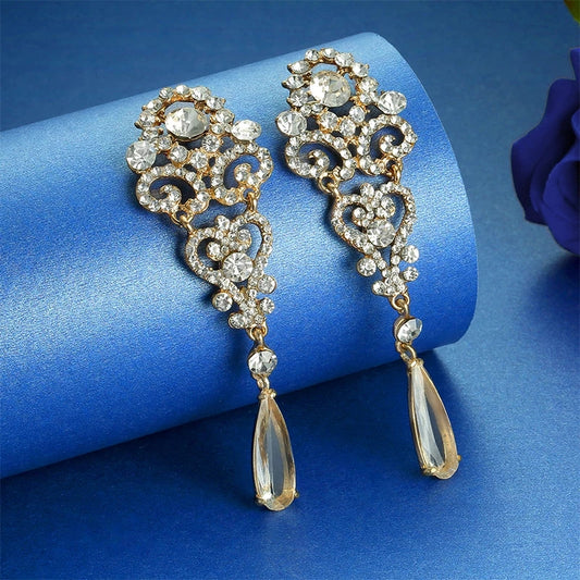 Long Gold earrings with dangling crystal